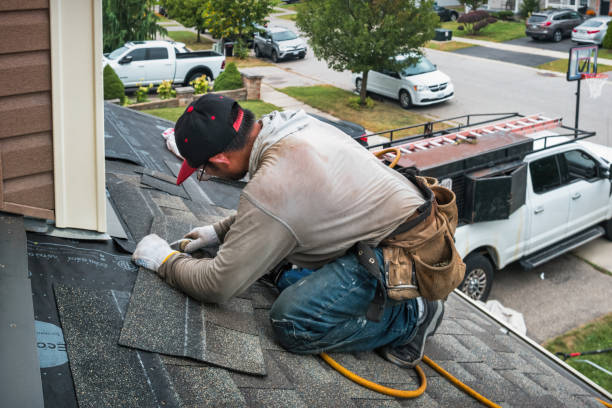 Professional Roofing technician working in Chester, ID